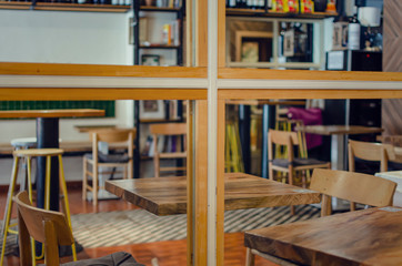 Interior of a restaurant after Covid-19 lockdown with QR codes on tables for the menu.