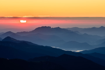 A picture of the sunrise over the alpine moutains range in Germanyfrom  highest peak Zugspitze. 