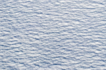 Snow texture with traces of weathering, winter background