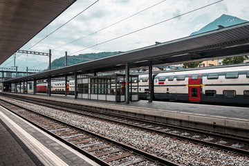 Fototapeta na wymiar Railway station in Switzerland. Perfect cleanliness on the platform