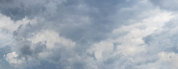 Panorama of dramatic stormy sky with gray clouds