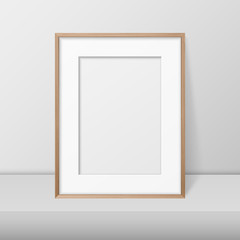 Vector 3d Realistic A4 Brown Wooden Simple Modern Frame on a White Shelf or Table Against a White Wall. It can be used for presentations. Design Template for Mockup, Front View