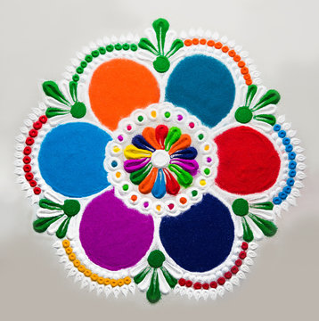 Rangoli design made with colourful powder for Diwali, Pongal, Onam festivals in India