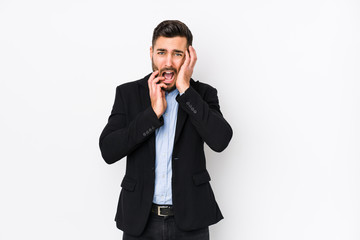 Fototapeta premium Young caucasian business man against a white background isolated whining and crying disconsolately.