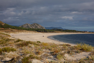 Lariñp Beach in arnota, Galicia, Spain and Louro peak in the horizon