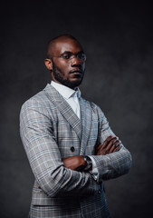 Well-dressed african business big shot looking at camera