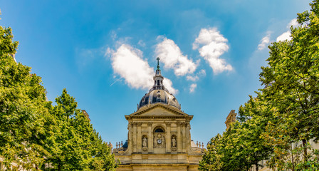 Fototapeta na wymiar View of the Sorbonne Chapel from Sorbonne square. Place de la Sorbonne was opened in 1639. It is located in Latin Quarter, Paris, France.