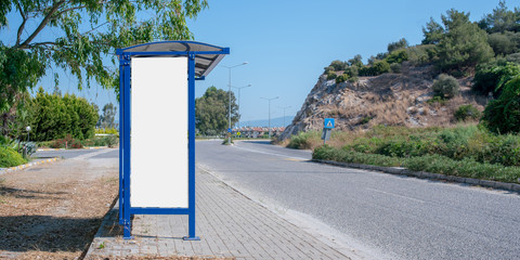 vertical white empty banner on bus stop on asphalt road highway background