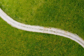Drone view of countryside dirt road