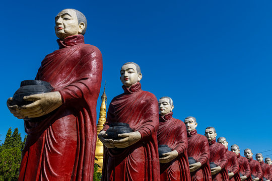 Myanmar, Kachin state, Aung Zay Yan Aung Pagoda, Staues of monks with alms