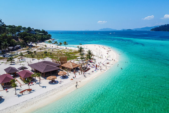 Thailand, Satun Province, Ko Lipe, Aerial view of people relaxing on North Point Beach in summer