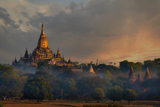 Myanmar, Mandalay Region, Bagan, Ancient Buddhist temple at foggy dawn