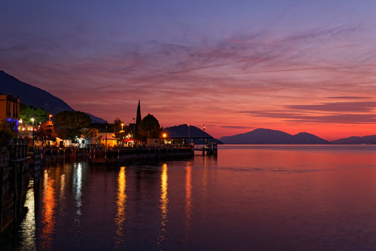 Italy, Lombardy, Sulzano, Lake&nbsp;Iseo harbor at sunset