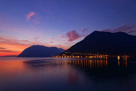 Italy, Lombardy, Sulzano, Lake&nbsp;Iseo&nbsp;harbor at sunset