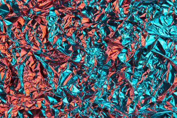 Abstract multicolored background made of crumpled foil.