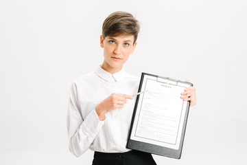 young brunette business woman in white shirt isolated on white background studio. Mock up copy space Hold clipboard with papers document