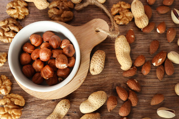 Banner assorted nuts. The dried nuts, hazelnuts, almonds and others. Healthy food, healthy snacks.