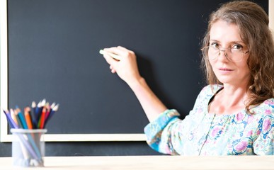 teacher welcoming students back to school