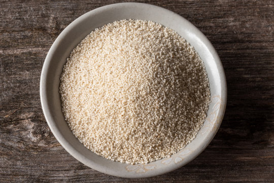 Uncooked Fonio Spilled in a Bowl