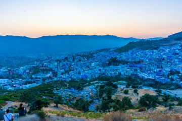 Obraz premium Beautiful sunset over the cityscape of Chefchaouen, the blue city of Morocco