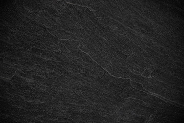Dark grey black slate background or texture.