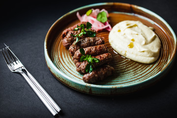 Beef donuts with onions and potatoes