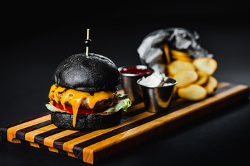 Black burger as a house specialty