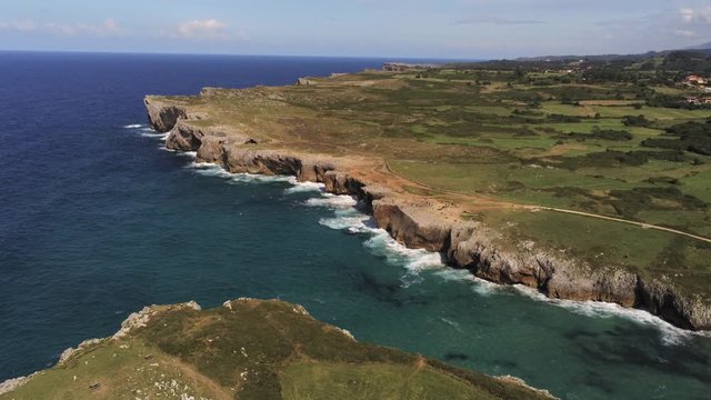 Asturias. Beautiful cliffs landscape. Guadamia beach. Pria blowholes. Spain. Aerial Drone Footage