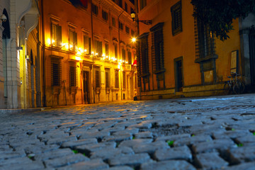 Cobblestone Road in Rome illuminated in the Night