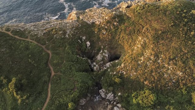 Asturias. Beautiful landscape in the coastal area of Gulpiyuri beach. Spain. Aerial Drone Footage