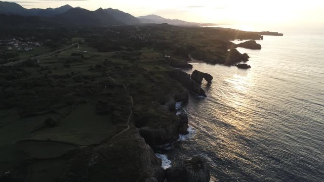 Asturias. Beautiful landscape in the coastal area of Gulpiyuri beach. Spain. Aerial Drone Footage