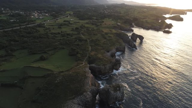 Asturias. Beautiful landscape in the coastal area of Gulpiyuri beach. Spain. Aerial Drone Footage