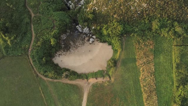 Asturias. Beautiful landscape in the coastal area of Gulpiyuri beach. Spain. Aerial Drone Footage
