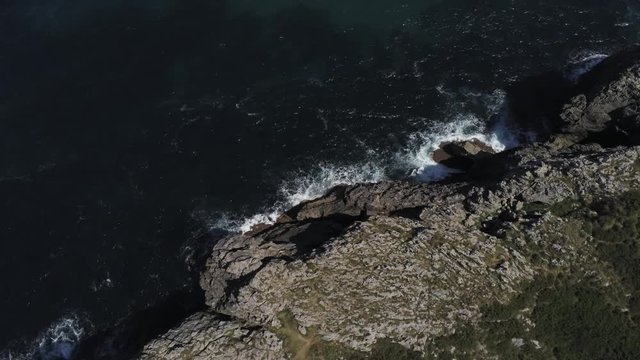 Asturias. Beautiful landscape in the coastal area of Gulpiyuri beach. Spain. Aerial Drone Footage