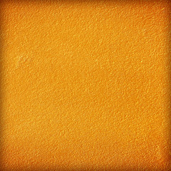 Naklejka premium Gold or yellow paint on cement wall texture or backgrond