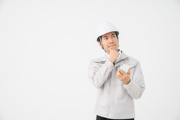 ビジネスマン　作業服　スマホ　トラブル