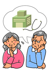 医療について悩む高齢者の夫婦
