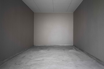 Perspective of Empty dark basement concrete room.