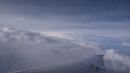Fototapeta na wymiar Flying Through Clouds