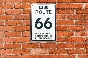 Fototapete Route 66 US Route 66 National Historic Highway sign on red brick wall, Galena, Kansas, USA  © Brian Scantlebury