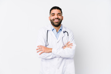 Young arabian doctor man isolated laughing and having fun.