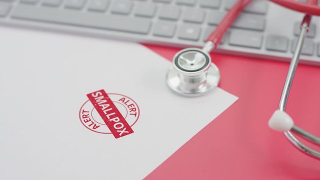 SMALLPOX ALERT stamp on the paper, doctor's workplace
