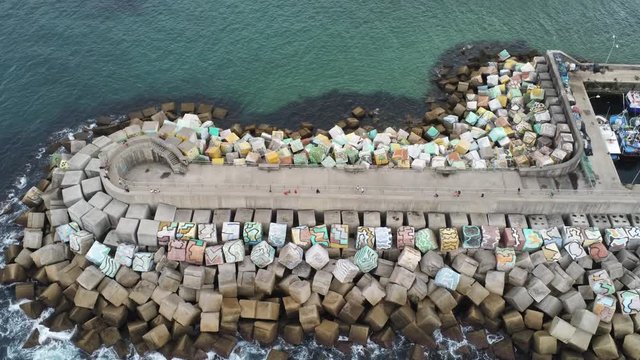 Harbour in Llanes, beautiful coastal village of Asturias,Spain. Aerial Drone Footage