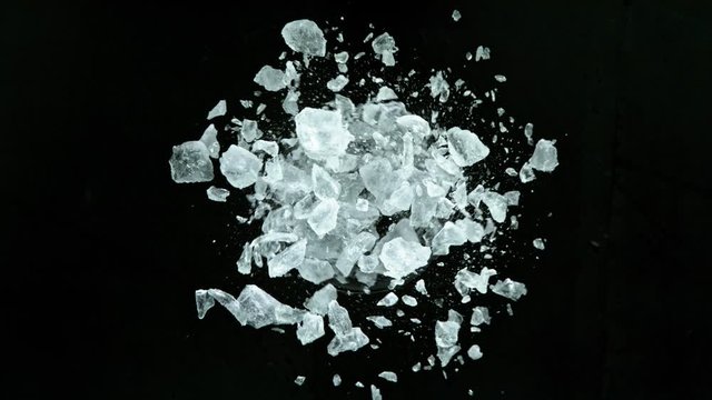 Super Slow Motion Shot of Exploding Crushed Ice Towards Camera at 1000fps.