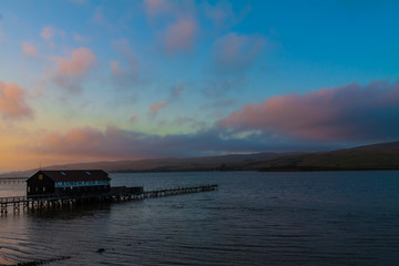 Boat House and Pier at Sunset on The  Shore of Tomales Bay, Inverness, Pt. Reyes National Sea Shore,California,USA