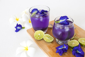 herbal healthy drinks  mix lemon and  flower butterfly pea purple cold cocktail water local flora...