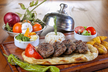 grilled barbeque meatballs service in a restaurant