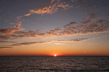 Sunrise on Lake Michigan horizon 