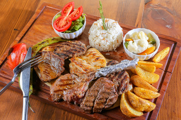 grilled steak dish course food meal in a restaurant on wood