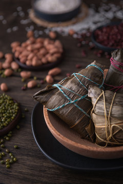 Traditional Chinese rice dumplings called Zongzi. They usually eat them during the traditional Dragon boat festival in June.